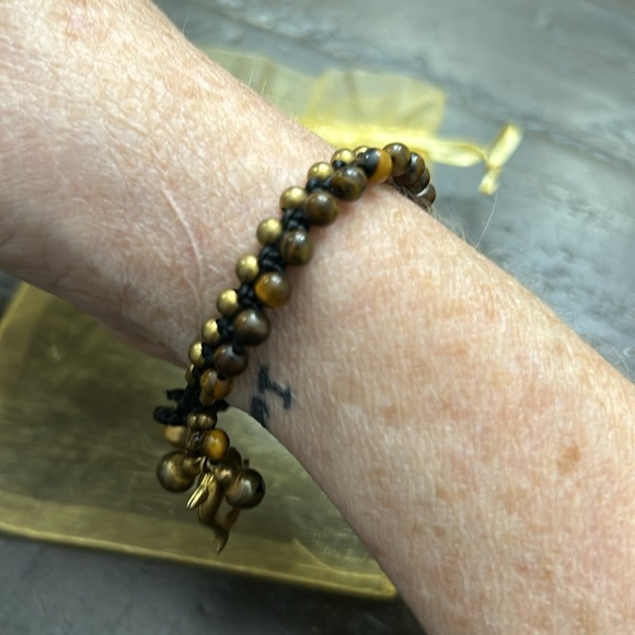 Brown and bronze colored beaded dolphin bracelet. - Picture 3 of 5